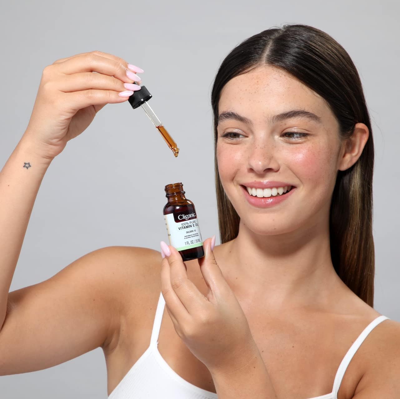 Cliganic Organic Vitamin E Oil for skin, hair, and nails—additive-free care.