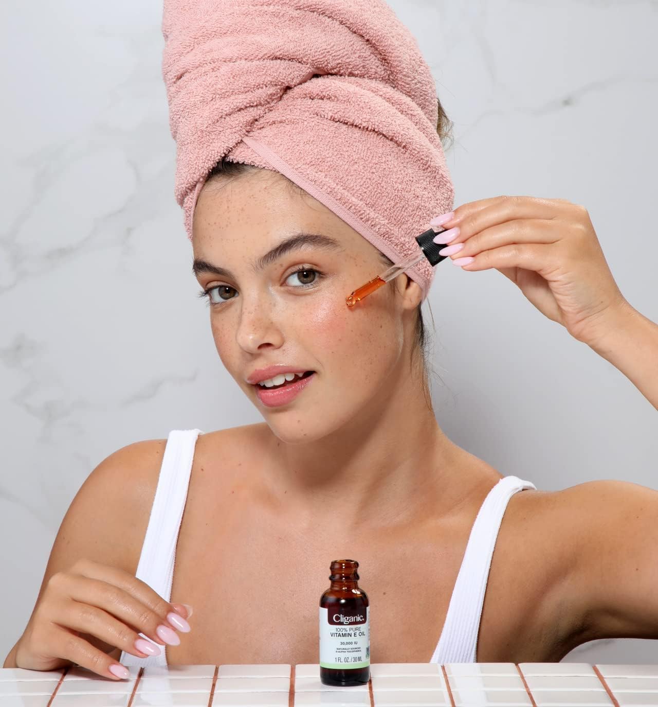 Cliganic Vitamin E Oil 2oz dropper—easy topical application for face and hair.