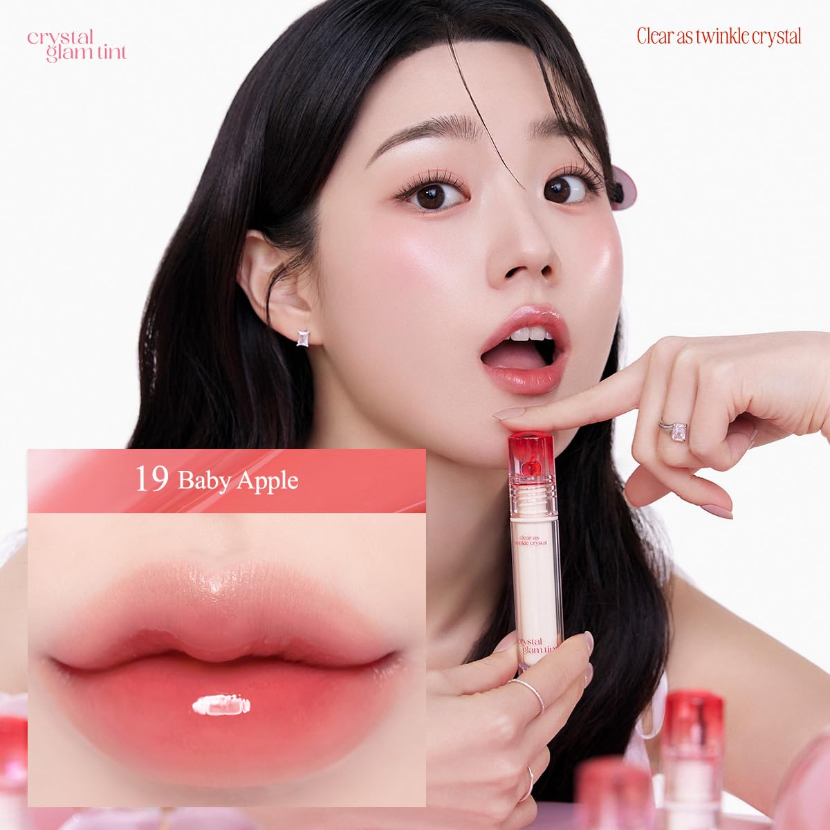 CLIO Crystal Glam Tint gloss on lips with high shine.