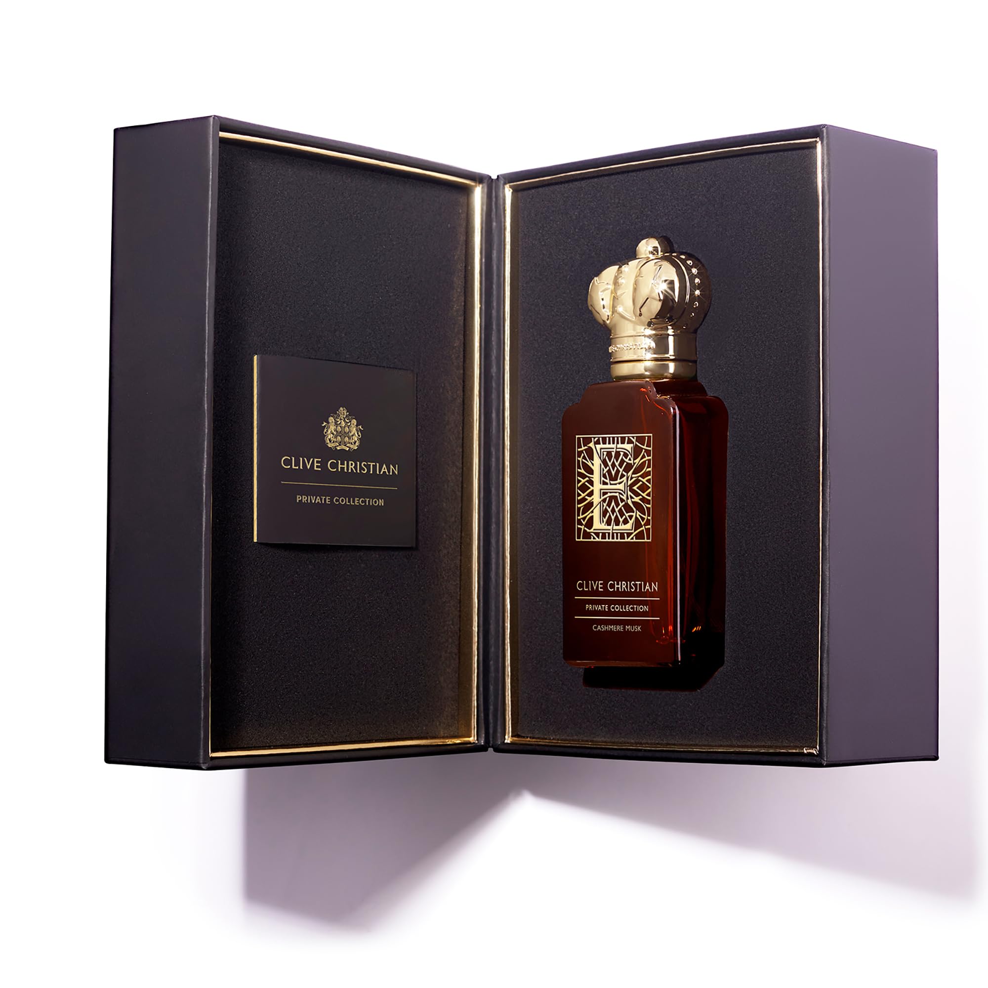 Clive Christian Private Collection E Cashmere Musk crystal cap close-up, premium presentation.