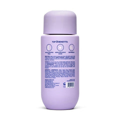 Misting the Cloud Volumizing Leave-In for even application on damp hair