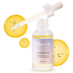 Clover Balancing Oil bottle close-up showing fragrance free formula for calm skin