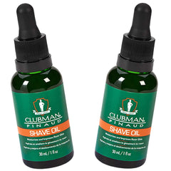 Clubman Pinaud Pre Shave Oil bottle pour for smooth razor glide and hydration.