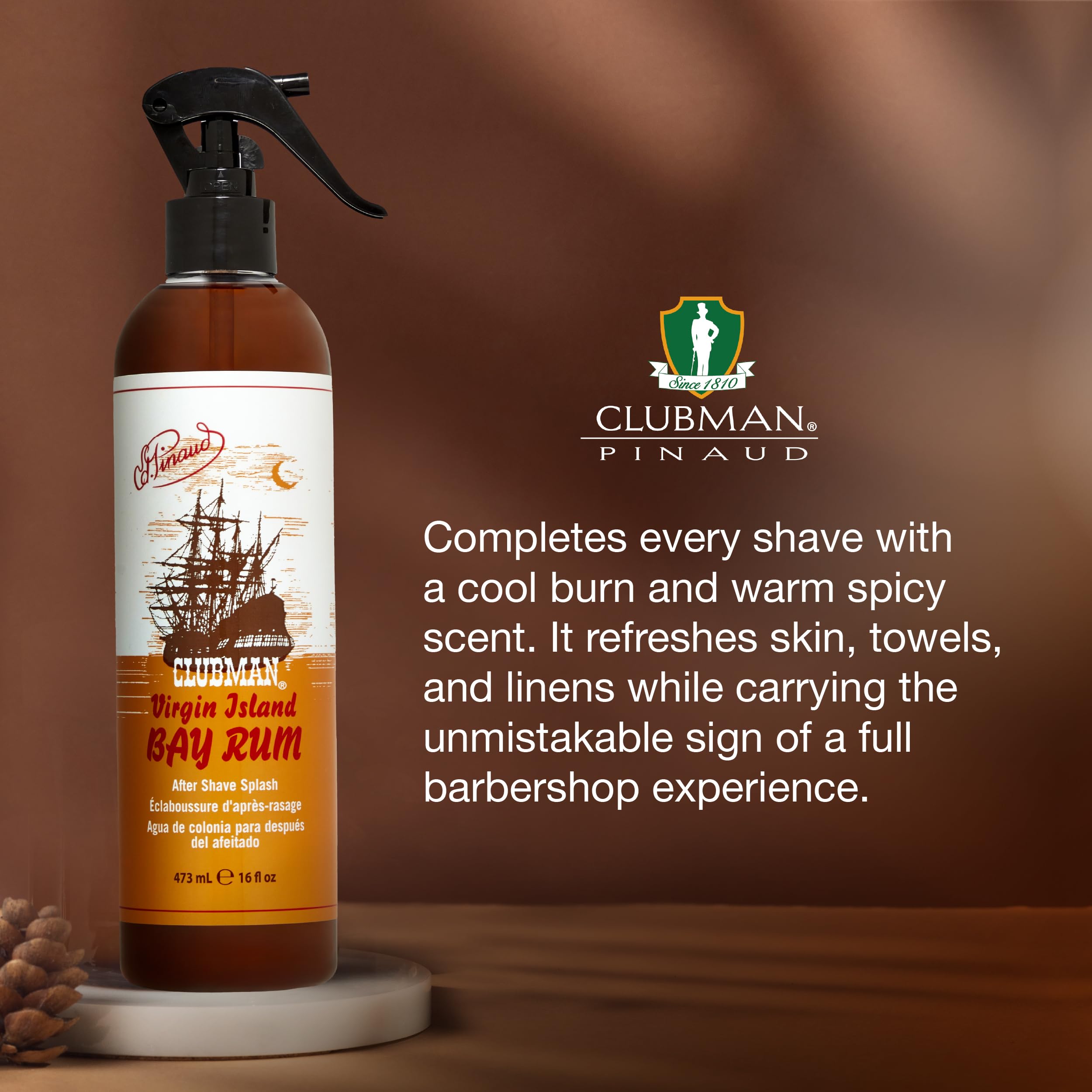 Clubman Virgin Island Bay Rum spray bottle during use for a crisp post-shave splash.