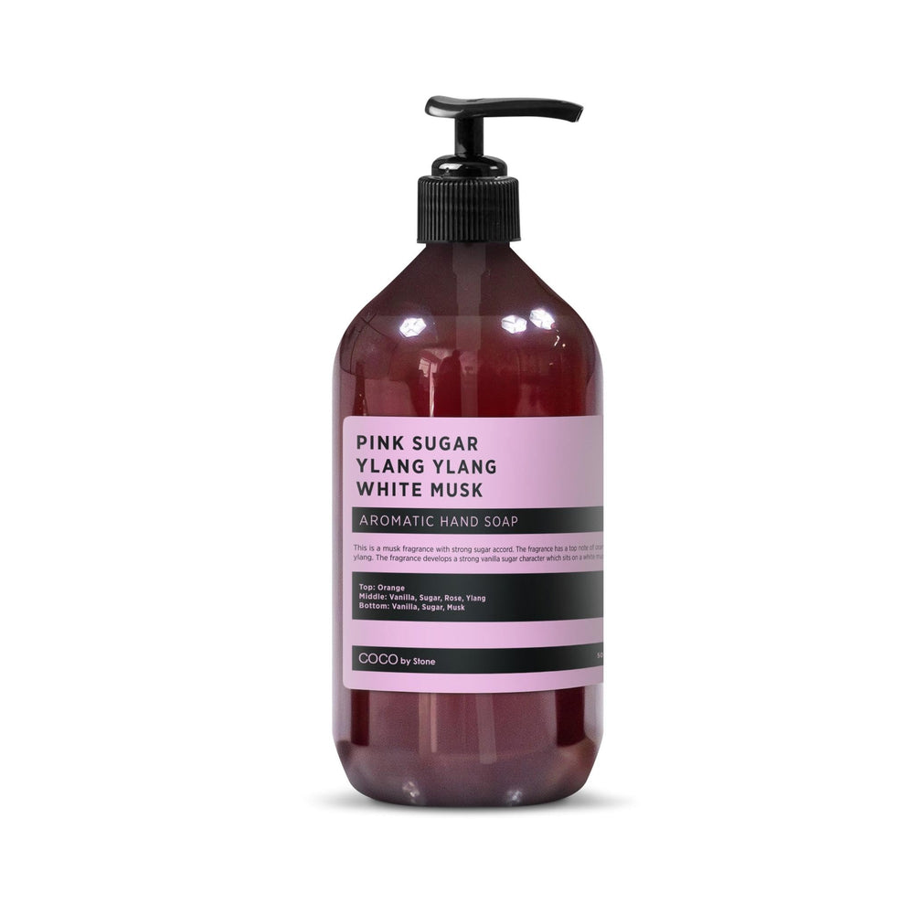 COCO by Stone Pink Sugar bottle on sink for luxury hand cleansing
