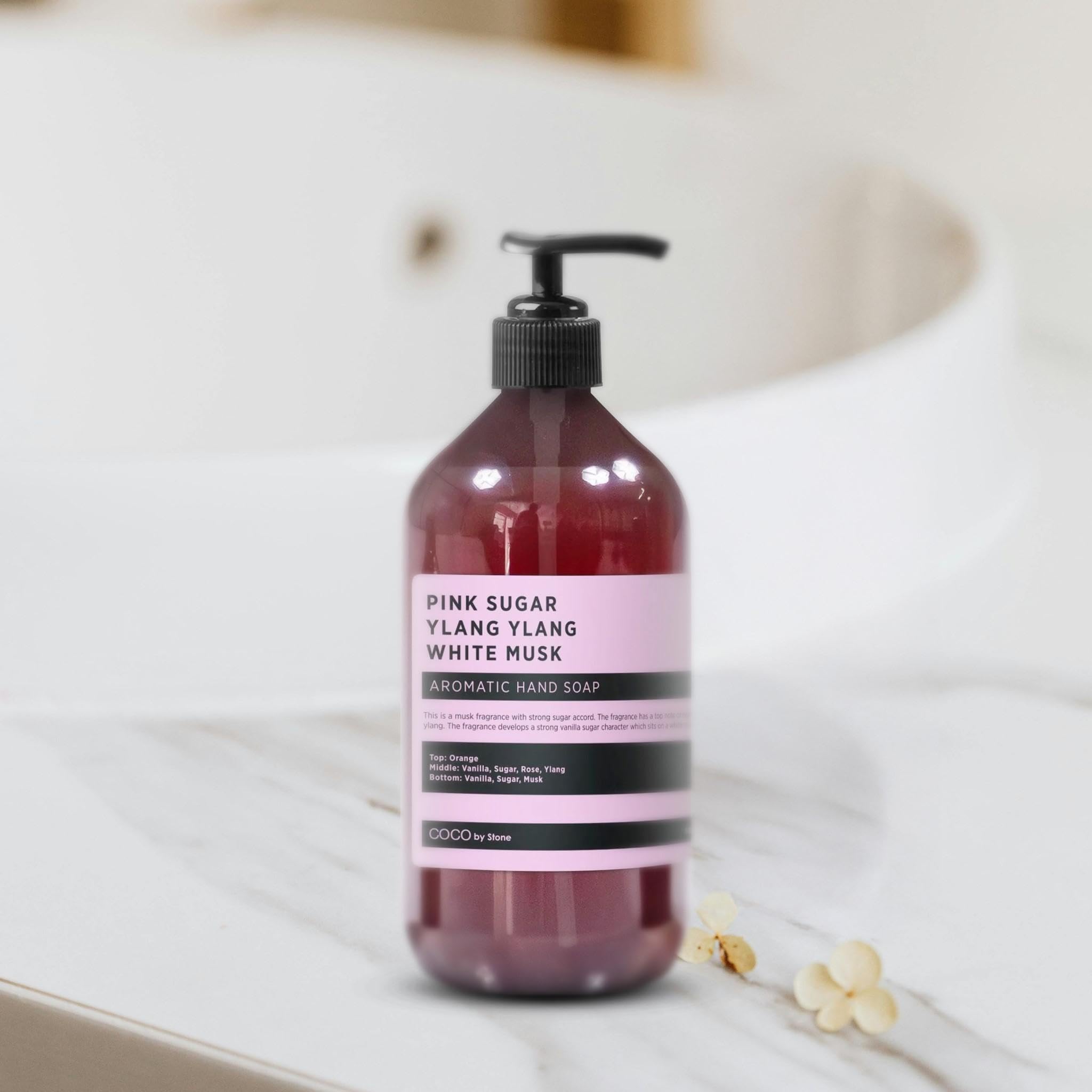 COCO by Stone 16oz bottle on sink with pump for quick access