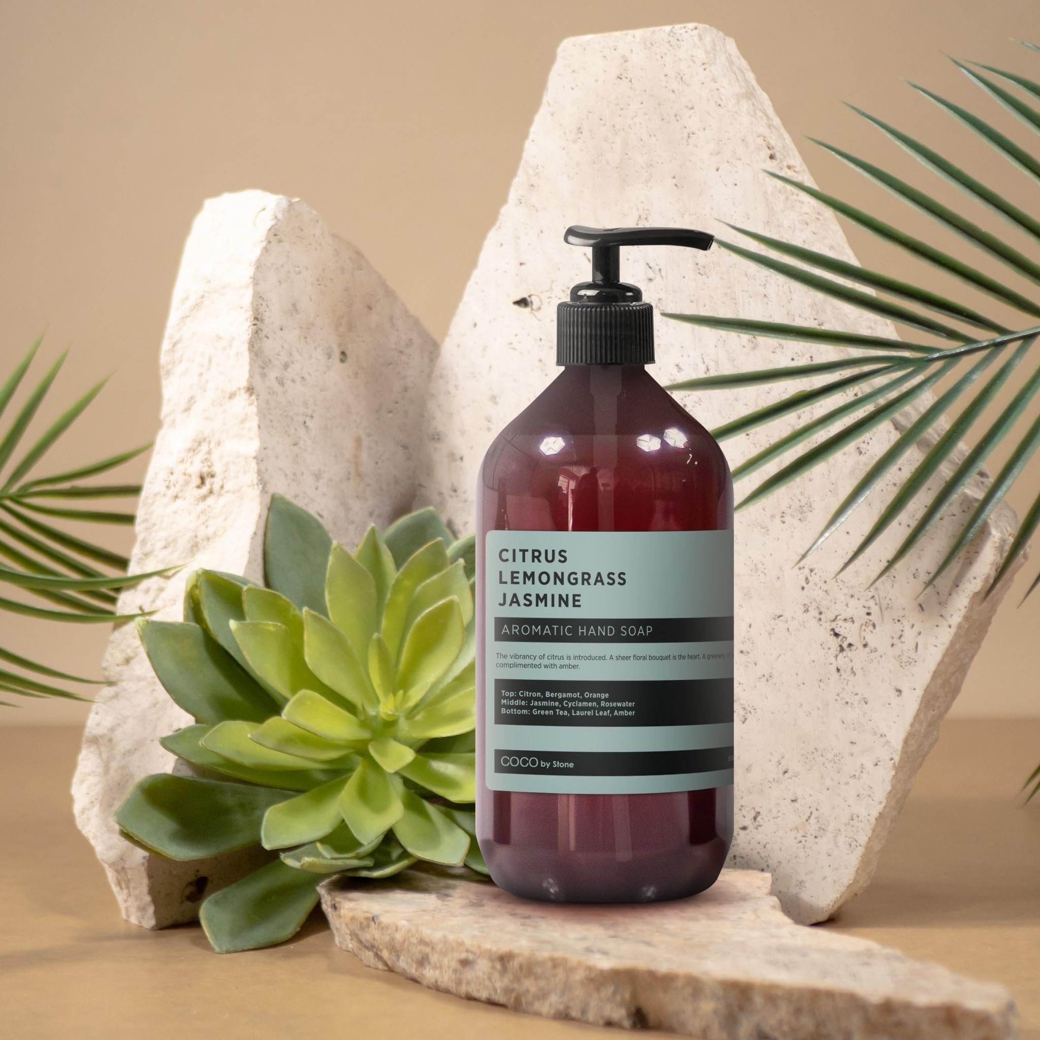 Vanity display showing COCO by Stone hand soap with bright label.