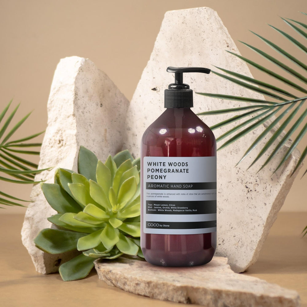 COCO by Stone Peony bottle close-up displaying floral-fruit fragrance
