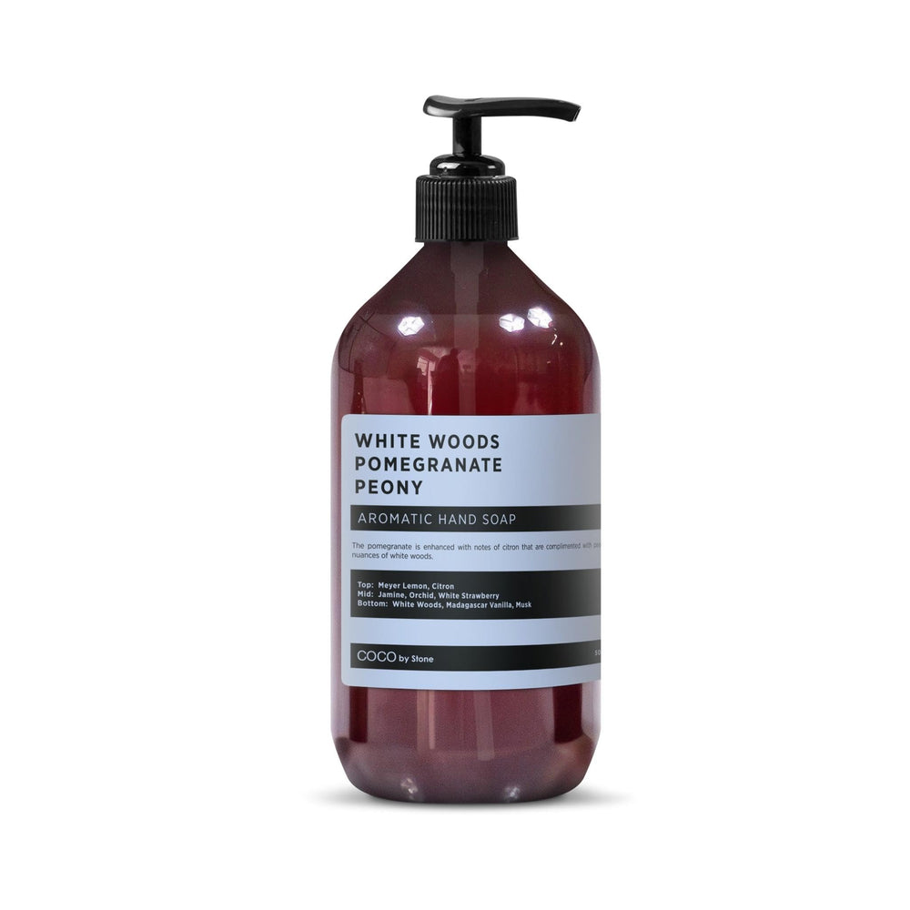 COCO by Stone White Woods hand soap bottle pour showing gentle cleansing