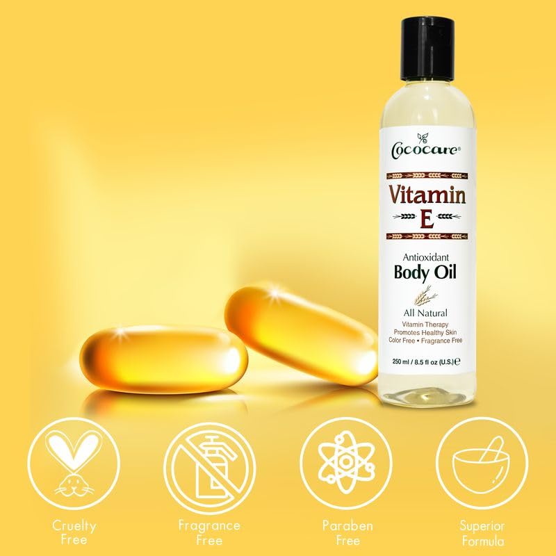 COCOCARE Vitamin E body oil made in USA bottle on clean backdrop.