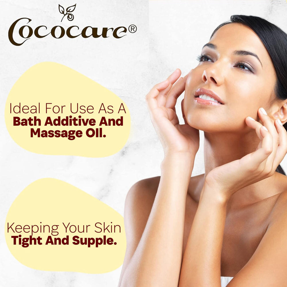 COCOCARE Vitamin E body oil pour for massage, promoting smooth, hydrated skin.