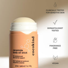 Cocokind Ceramide Body Oil Stick texture close-up highlighting rich hydration.