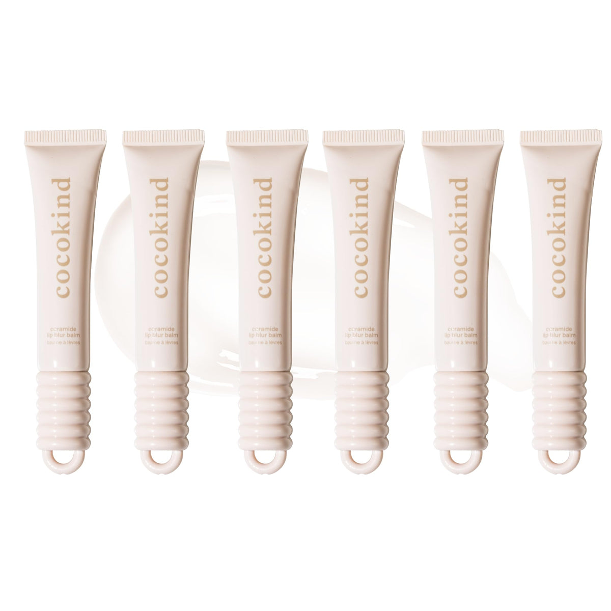 Cocokind Be Real Lip Blur Balm tube shows clear gloss for hydration