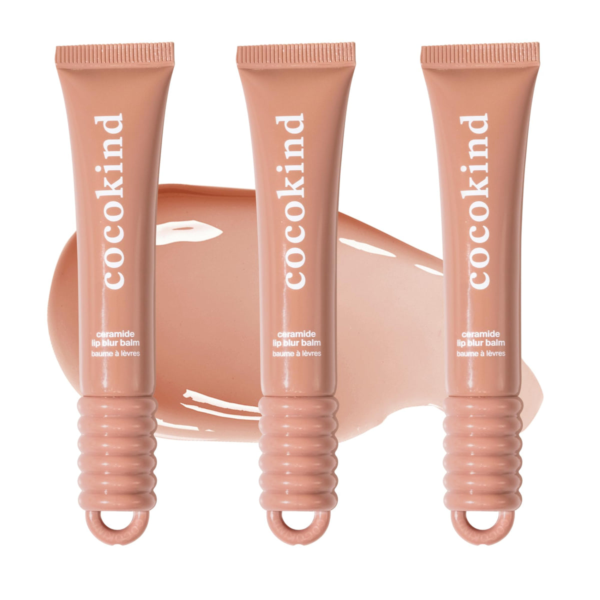 Cocokind Ceramide Lip Blur Balm applying with a soft glossy finish for hydrated lips.