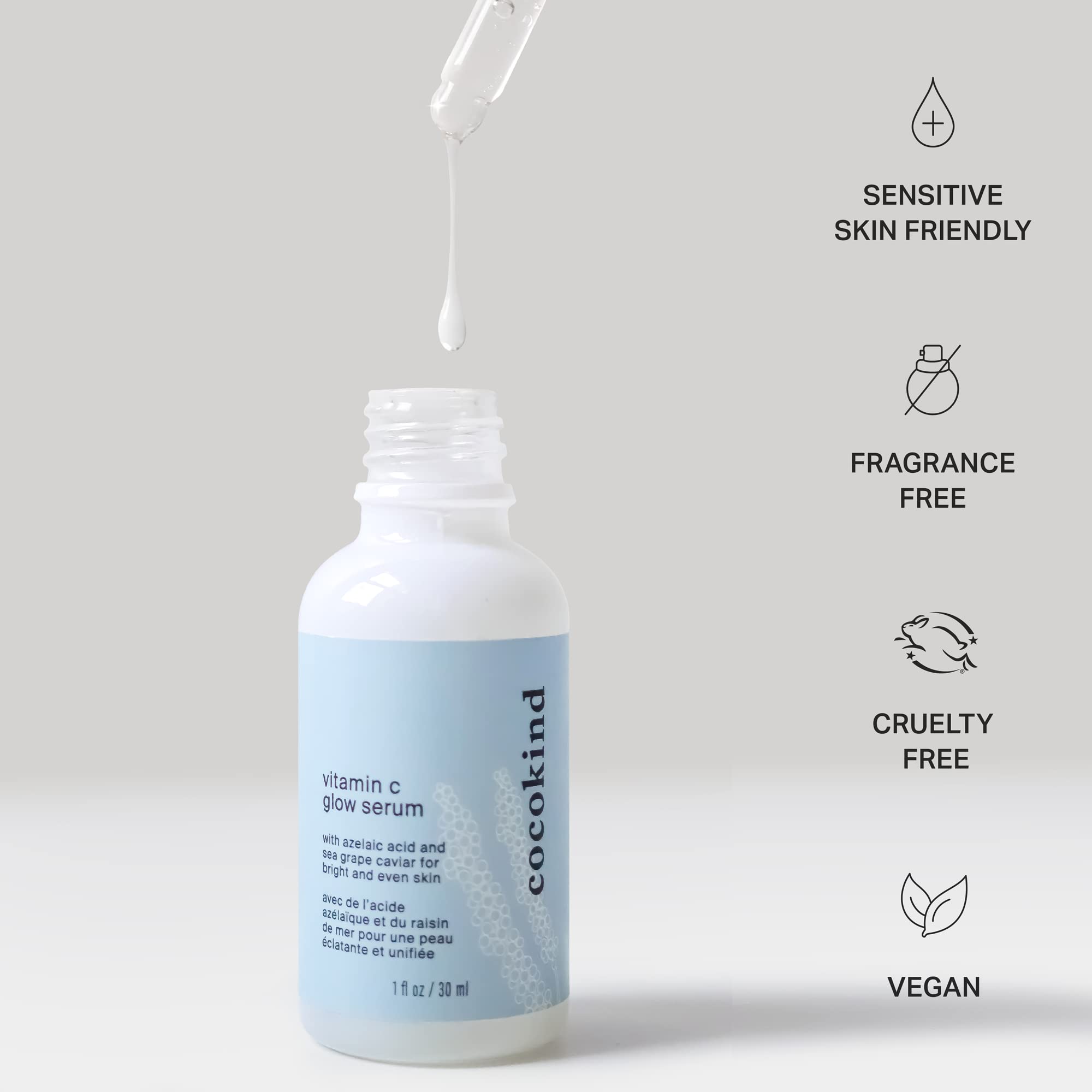 Fragrance-free Cocokind serum being softly applied to skin