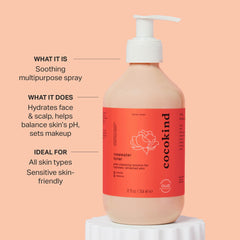 Cocokind Jumbo Rosewater Toner sprayed on scalp for hydration.