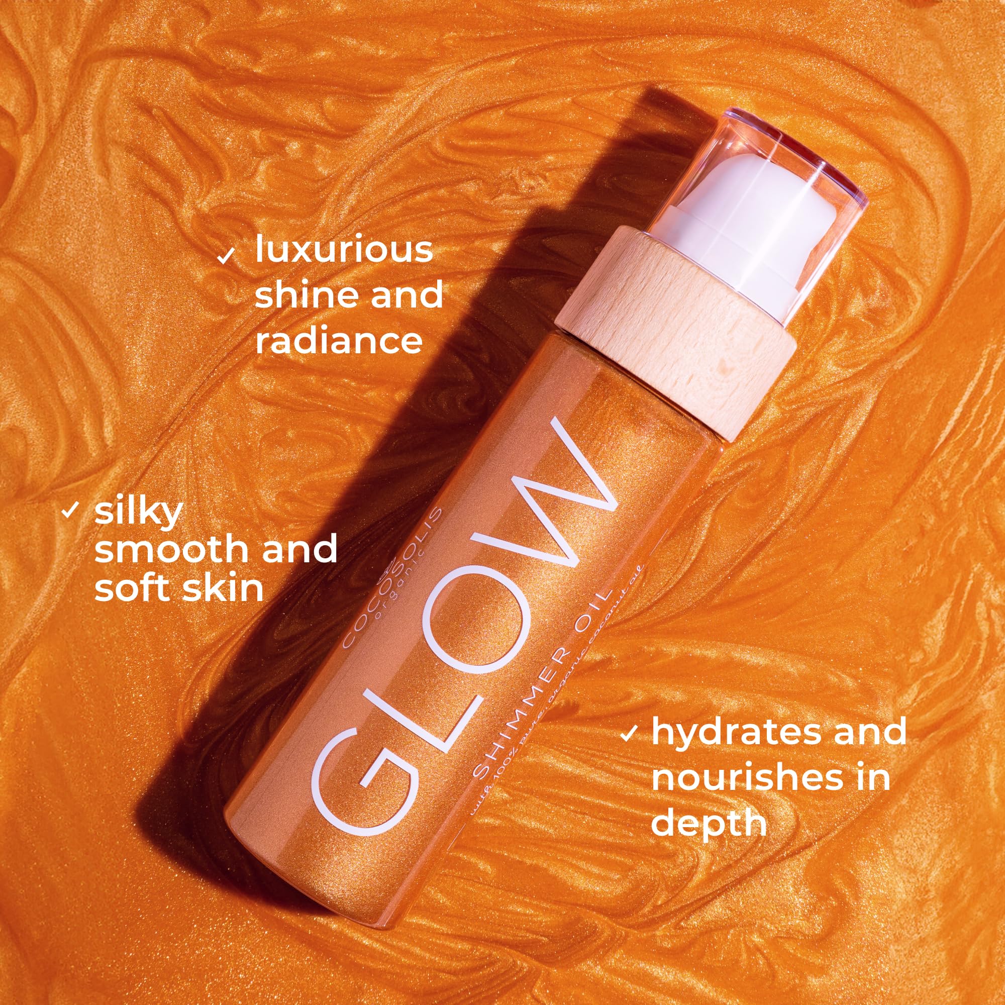 Luxurious packaging and jar of COCOSOLIS GLOW Shimmer Oil.