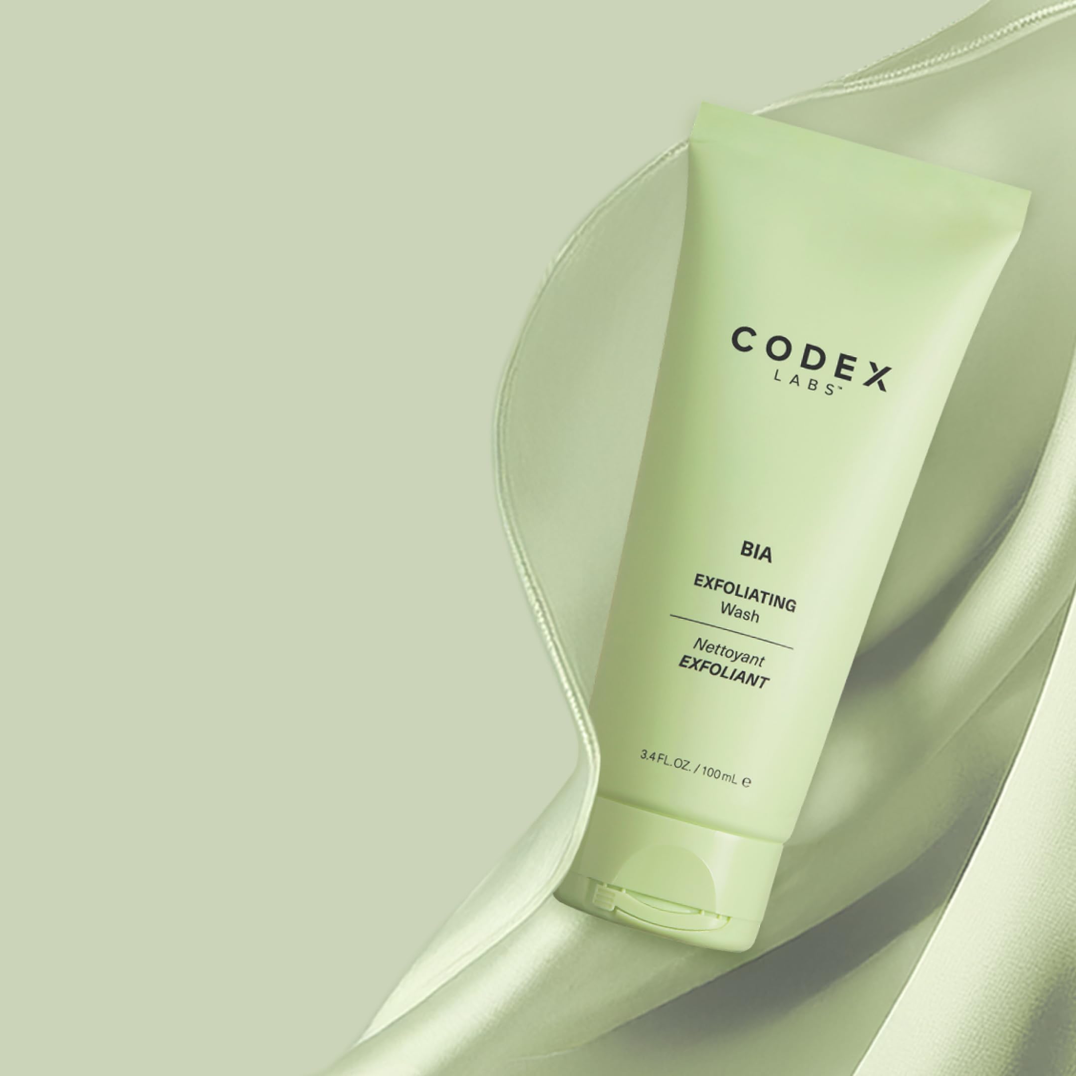 Codex Labs Bia exfoliating face wash on sink suggesting soft skin after cleansing.