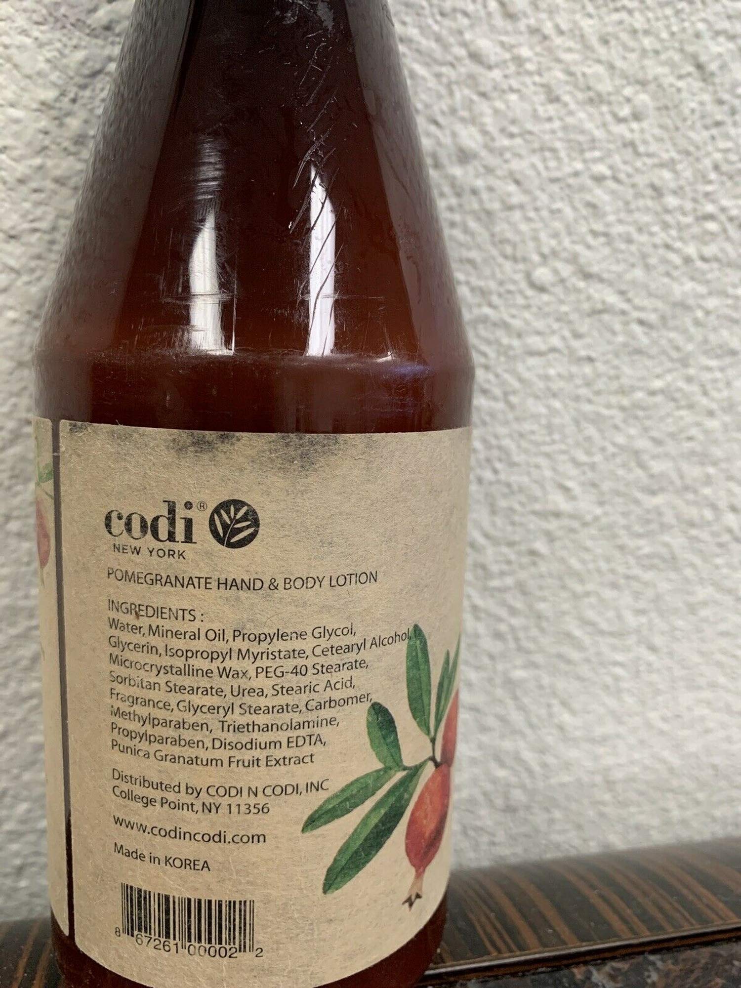 Hands being moisturized with CODi Pomegranate Lotion