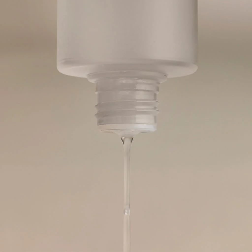 Colleen Rothschild Gentle & Clear Toner being applied with a cotton pad for gentle exfoliation