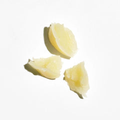 COLLEEN ROTHSCHILD Universal Rescue Balm dispensing, transforming into a silky liquid-gold oil on skin.