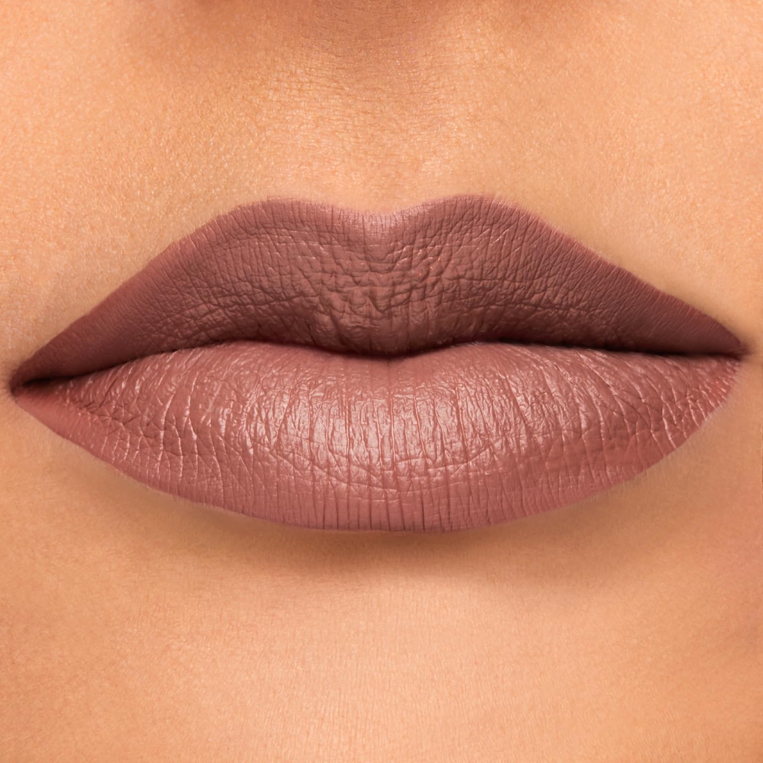 ColourPop Lippie Beeper sharpened pencil applied along lip line for feather-proof definition.