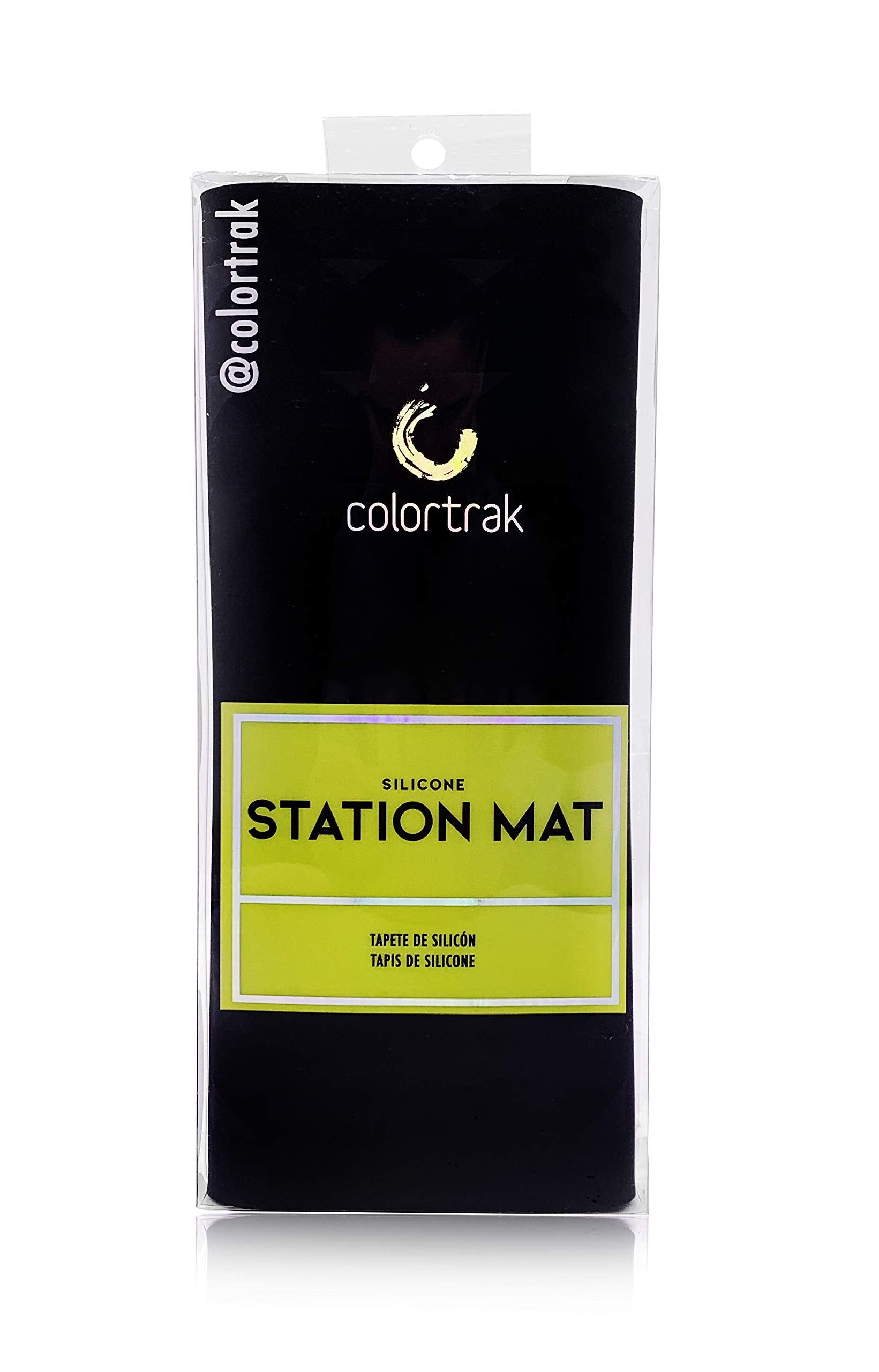 Colortrak station mat on counter with styling tools for safer work area.