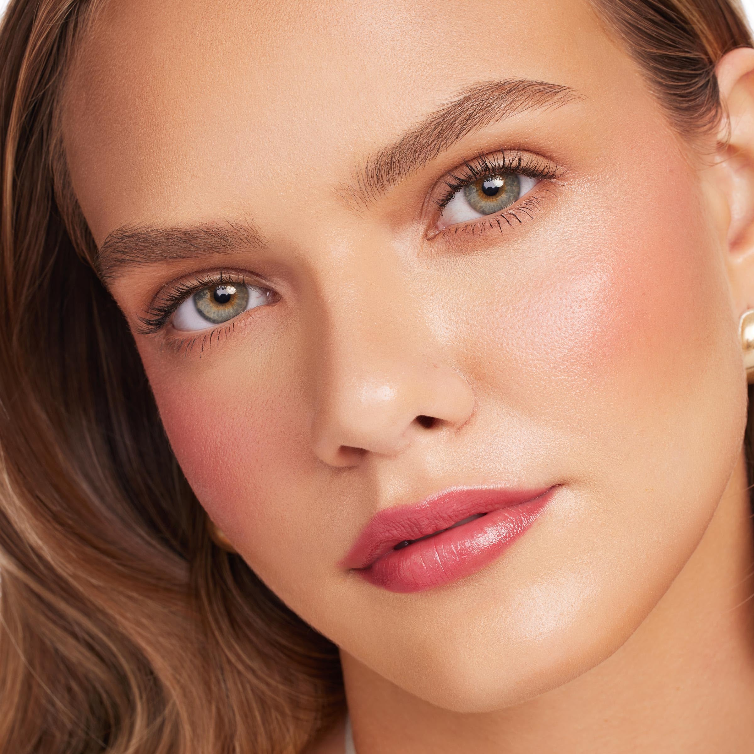 ColourPop Blush Stix can be blended with a brush for softer coverage.