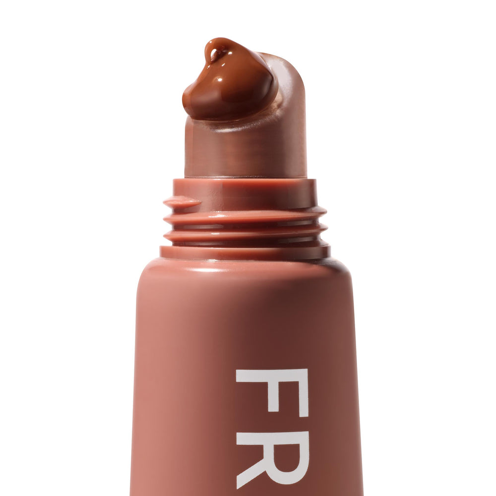 ColourPop Fresh Kiss Glossy Lip Balm on lips with subtle tint.