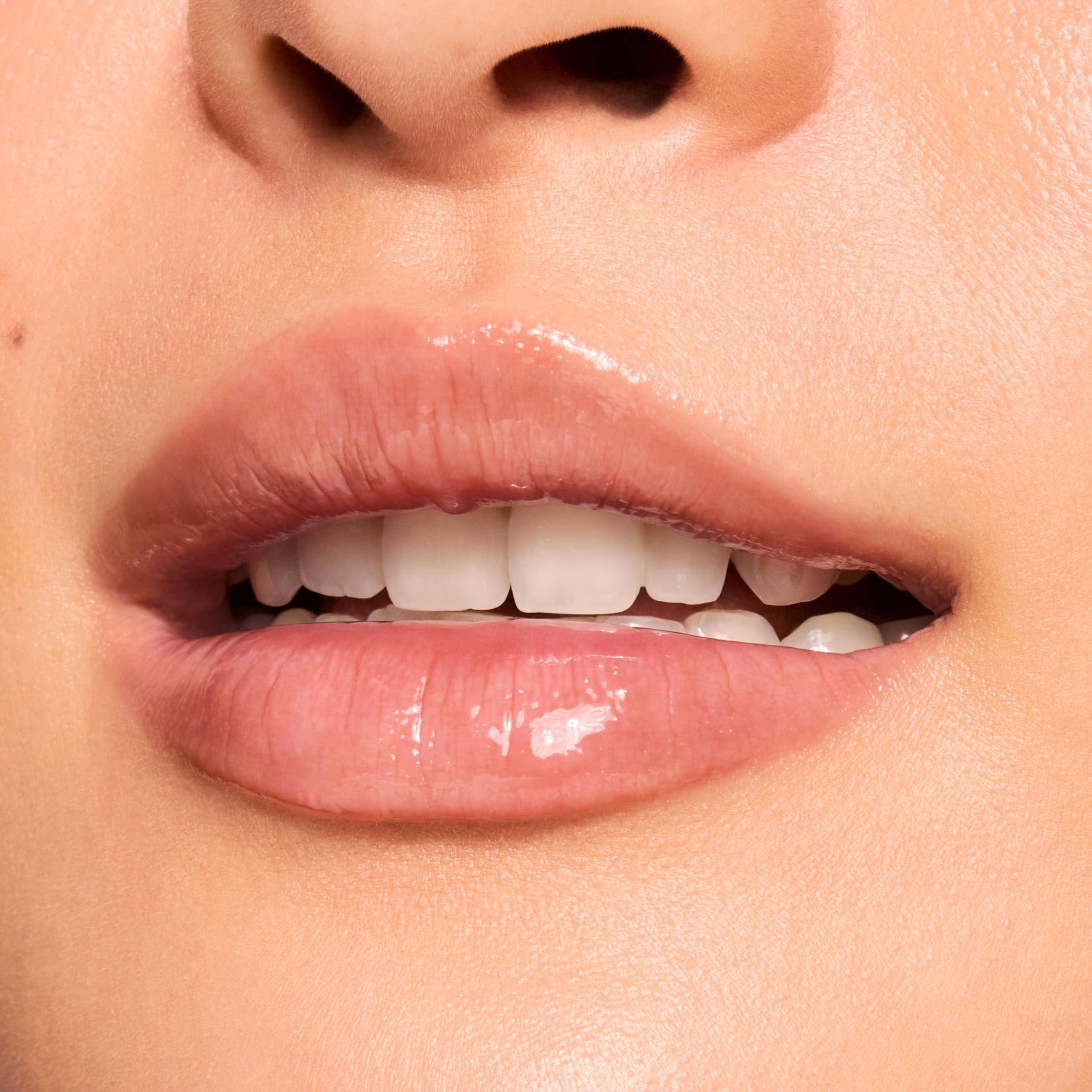 ColourPop Fresh Kiss Glossy Lip Balm with peptides nourishes lips.