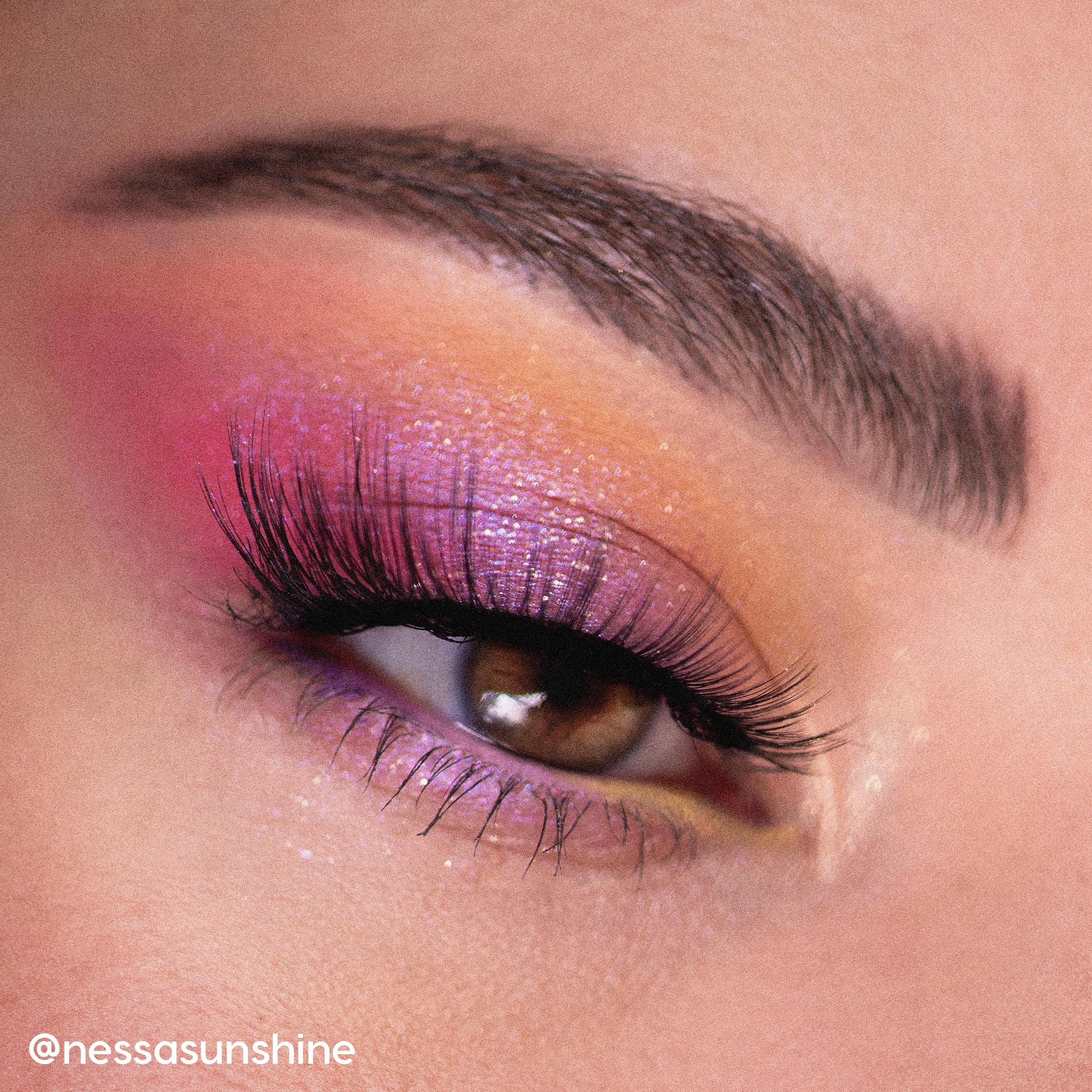 Twilight Flash swatch from ColourPop Sailor Moon palette in vibrant tangerine.