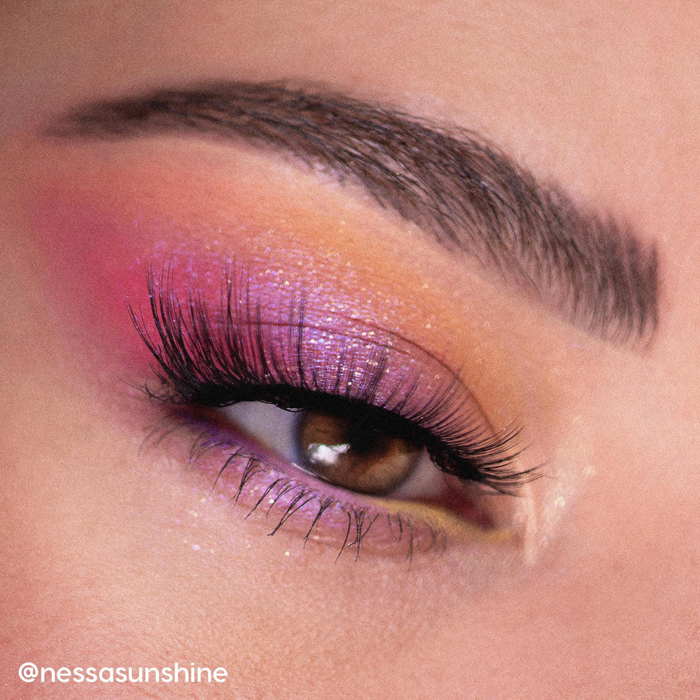 Twilight Flash swatch from ColourPop Sailor Moon palette in vibrant tangerine.