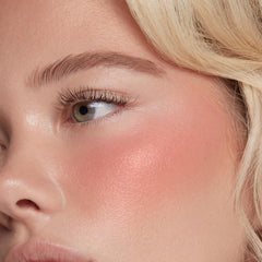 Close-up of ColourPop blush texture swirl indicating buildable color.