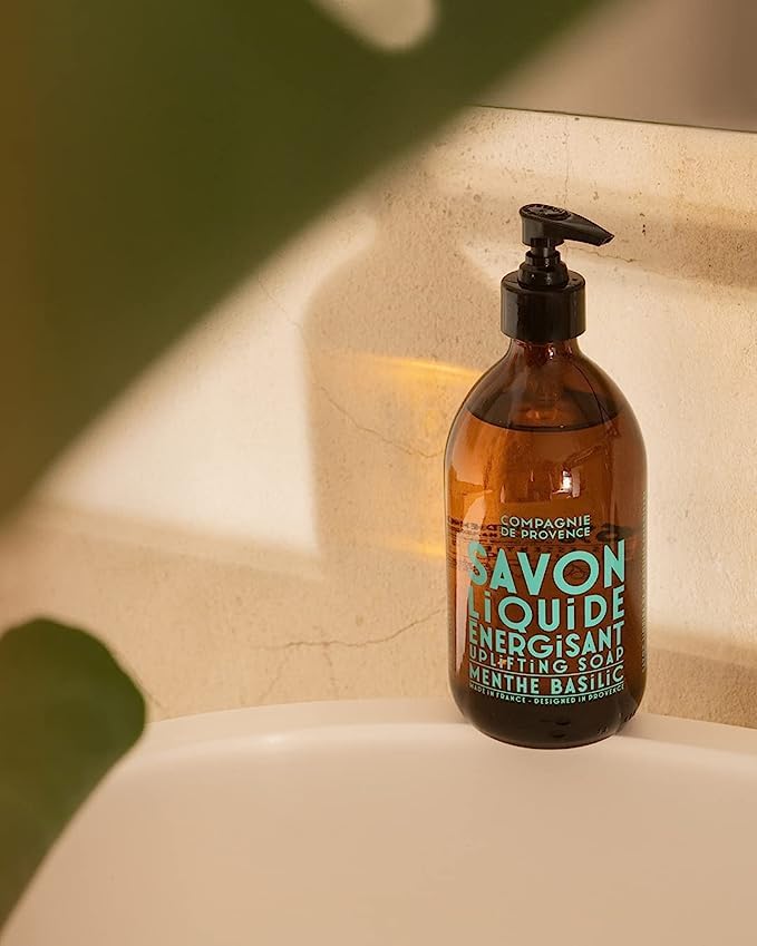 La Compagnie de Provence elegant glass pump bottle, refillable packaging for everyday use.