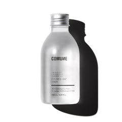 COMUNE AHA Exfoliant Toner bottle close-up, potential smoother skin.