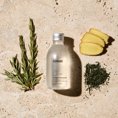 COMUNE AHA Exfoliant Toner pour shot suggesting even texture.