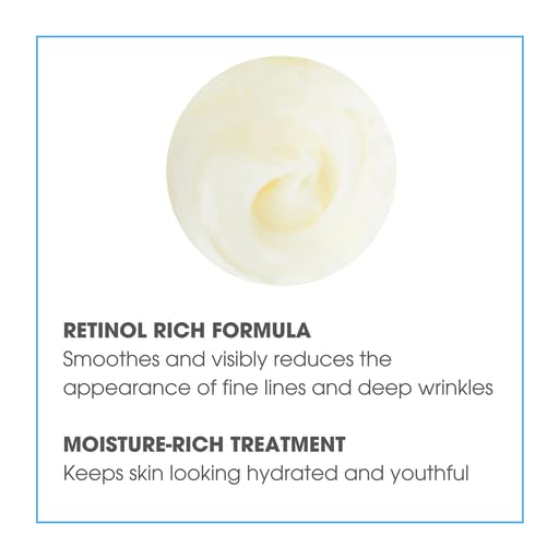 Consult Beaute Regenerol Retinol Face Cream spatula beside the jar for easy scooping.