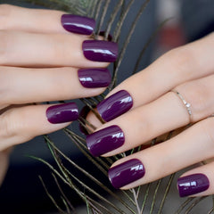 CoolNail dark violet nail tips for easy at-home manicures with precise fit.