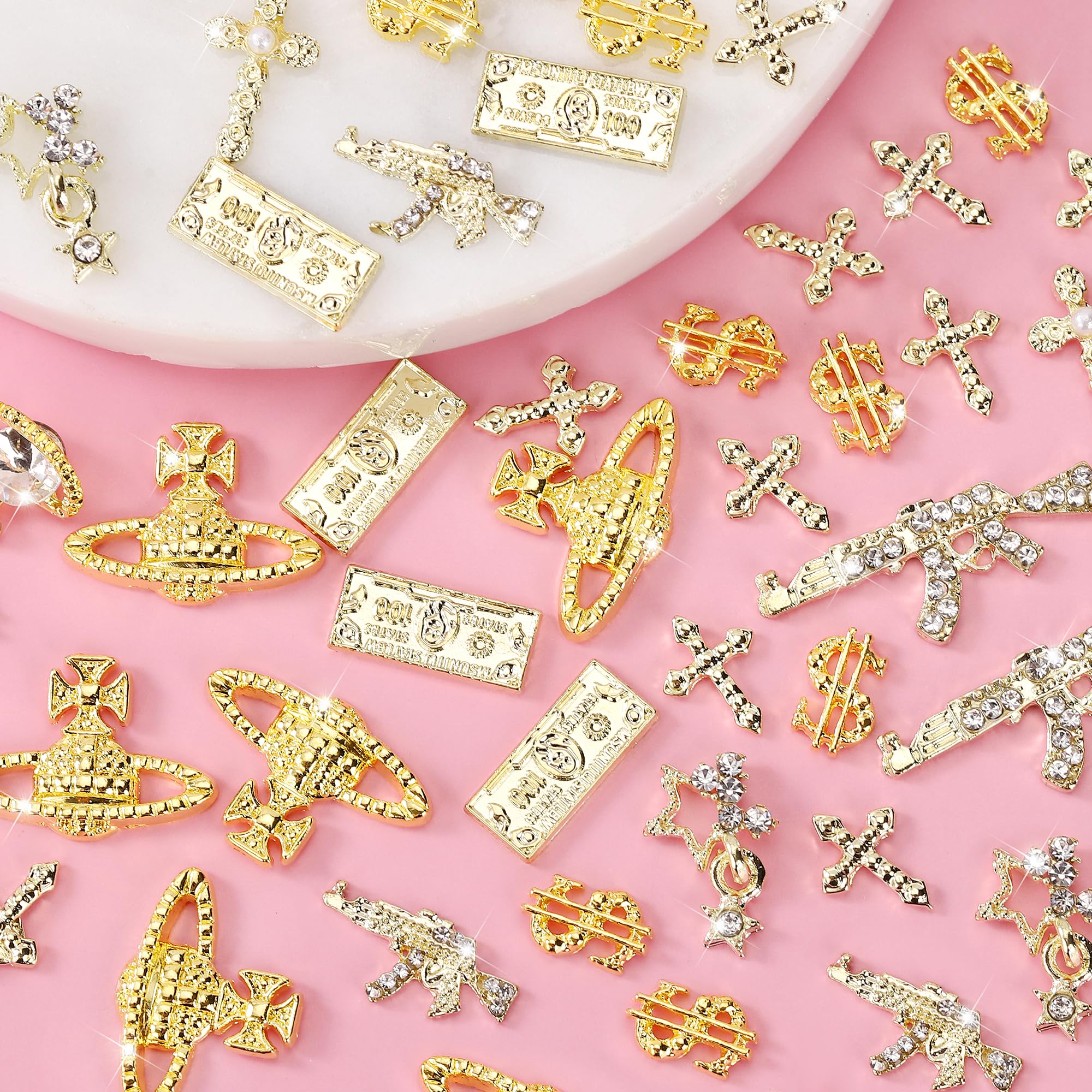 COOSLIM gun nail charms provide edgy sparkle for bold nail designs.