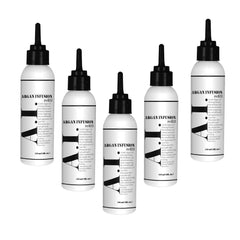 Cortex Professional Argan Oil Refill on hair provides glow and smoothness.