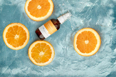 Cosmedica Vitamin C Super Serum dropper ready for precise application.