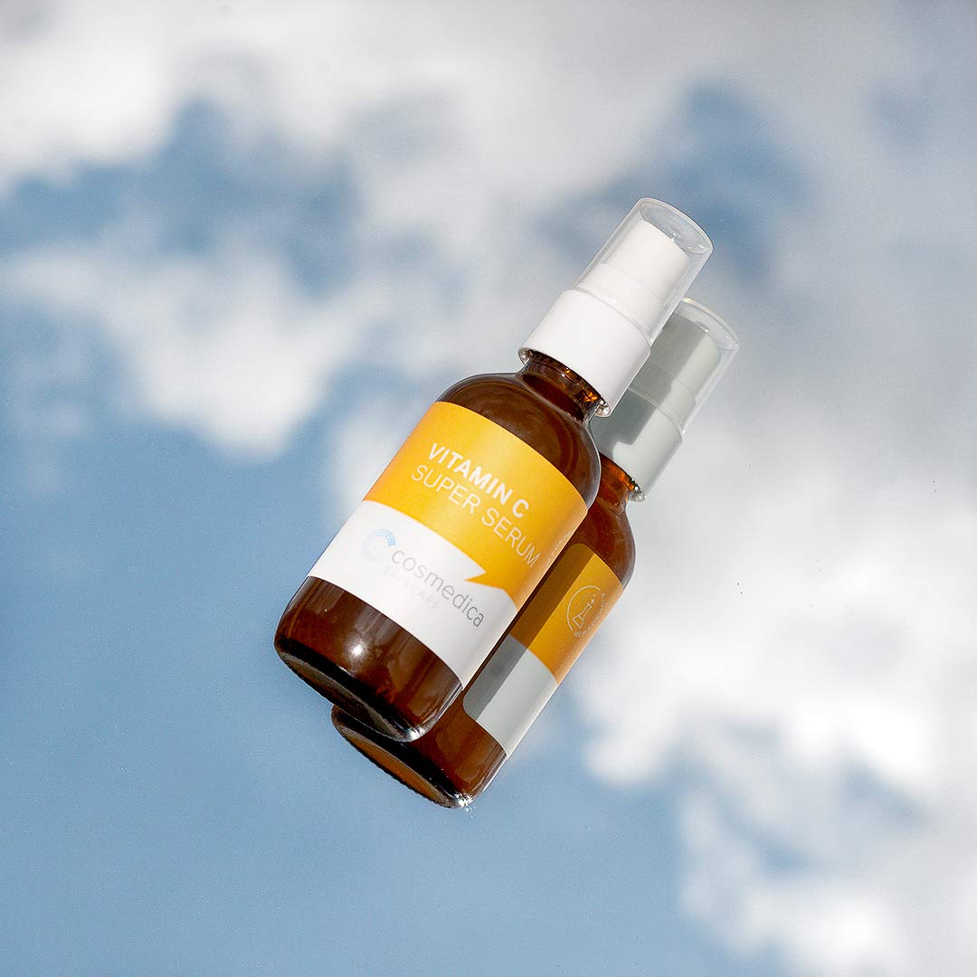 Cosmedica Vitamin C Super Serum routine display on vanity.