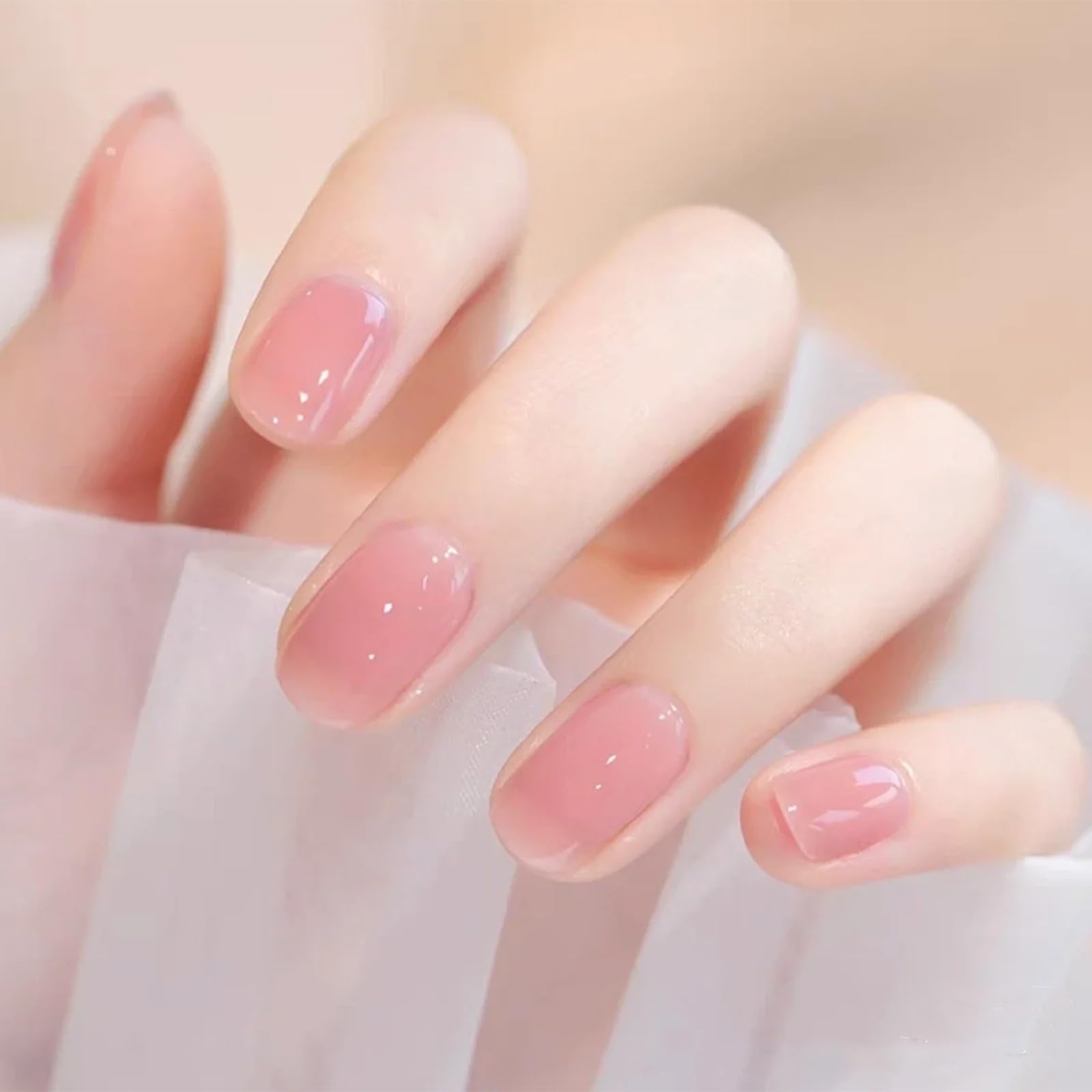 COSMOO Jelly Pink Nail Polish brush close-up showing smooth, even application.