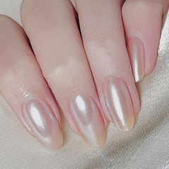 COSMOO Pearl Pink nail brush stroke demonstrates smooth, even color application.