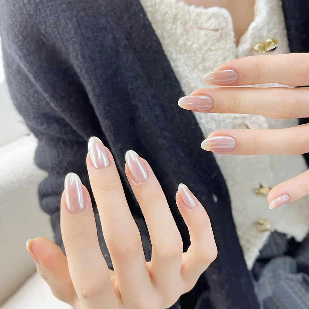 COSMOO Pearl Pink nail polish with top coat illustrates extended wear and gloss.