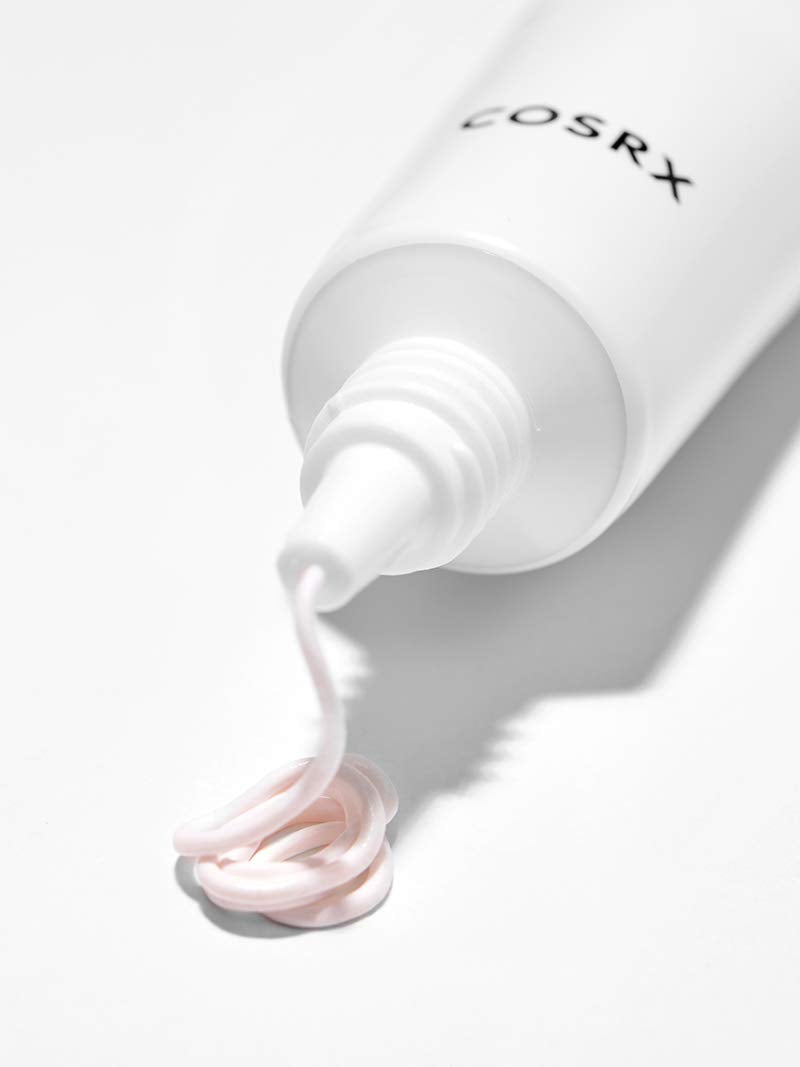 COSRX AC Collection Ultimate Spot Cream texture closeup illustrating light absorption.