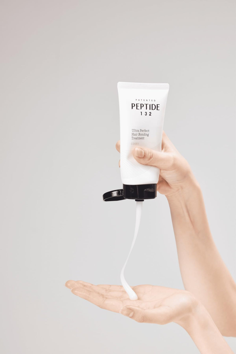Creamy texture of Peptide-132 on dry hair for smoother strands