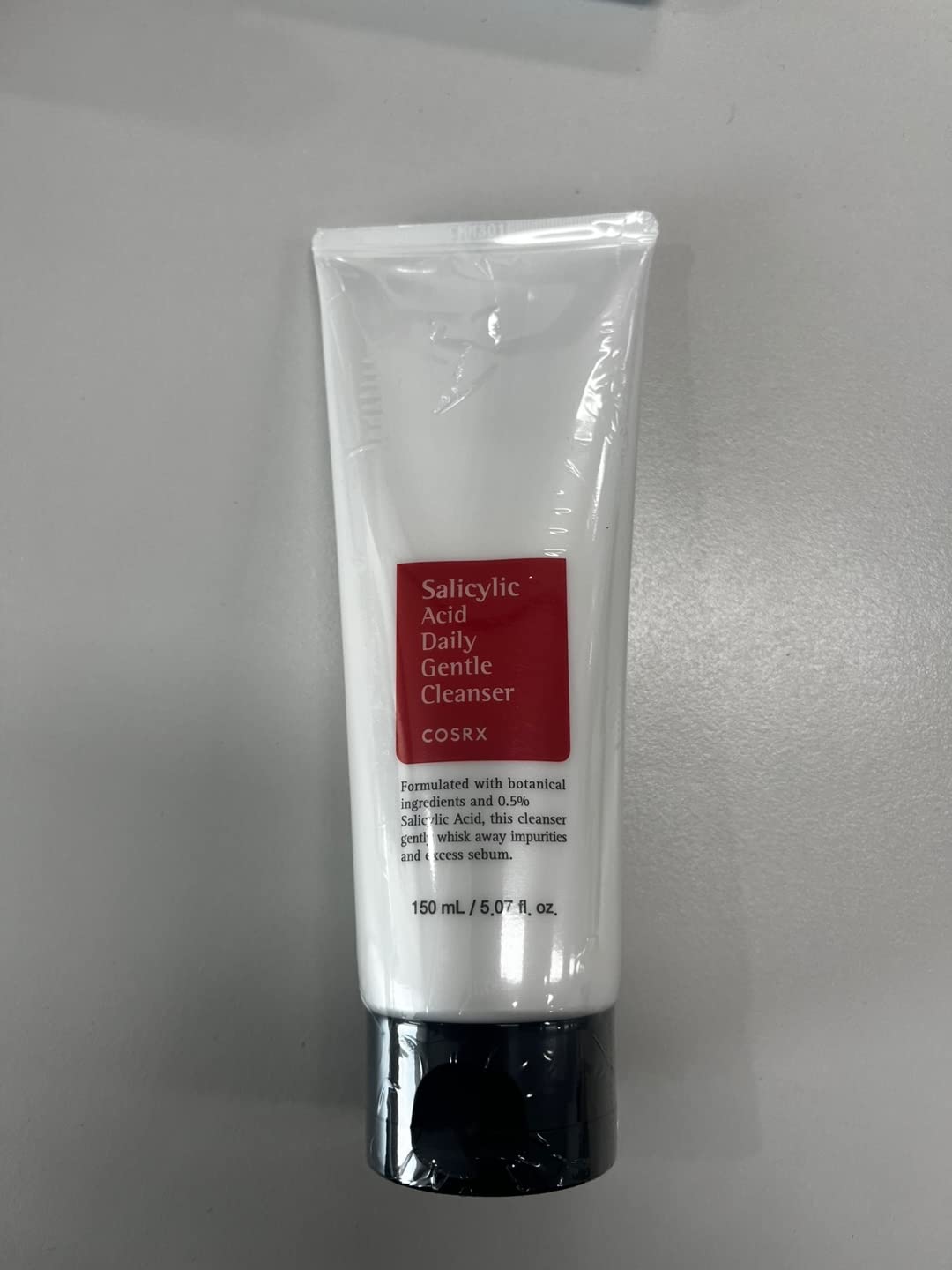 COSRX Salicylic Acid Daily Gentle Cleanser foam lather shows rich bubbles for a thorough cleanse.