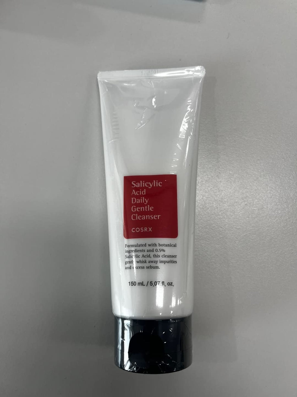 COSRX Salicylic Acid Daily Gentle Cleanser foam lather shows rich bubbles for a thorough cleanse.