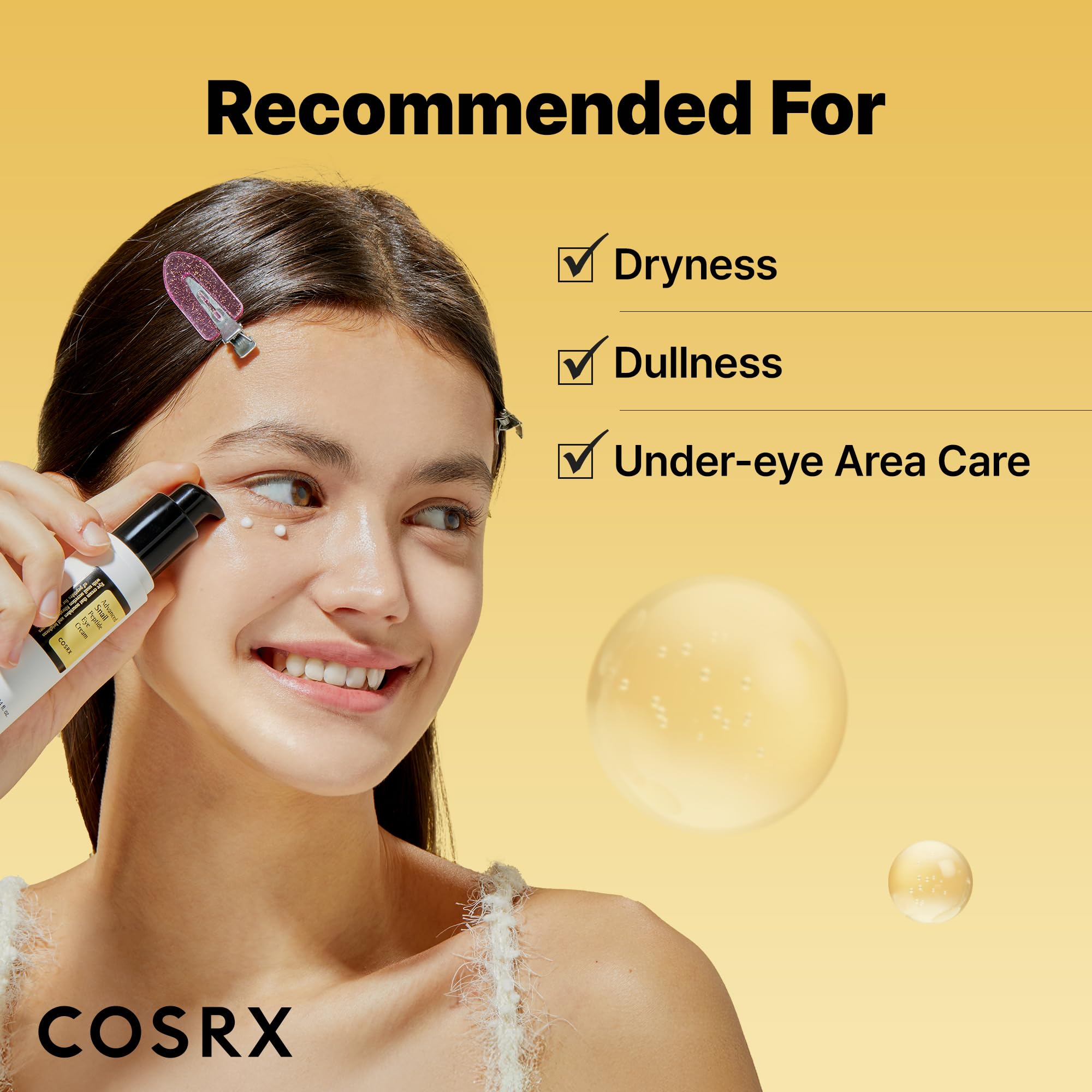 COSRX Snail Mucin Peptide Under Eye Cream on fingertip demonstrating gentle patting application.